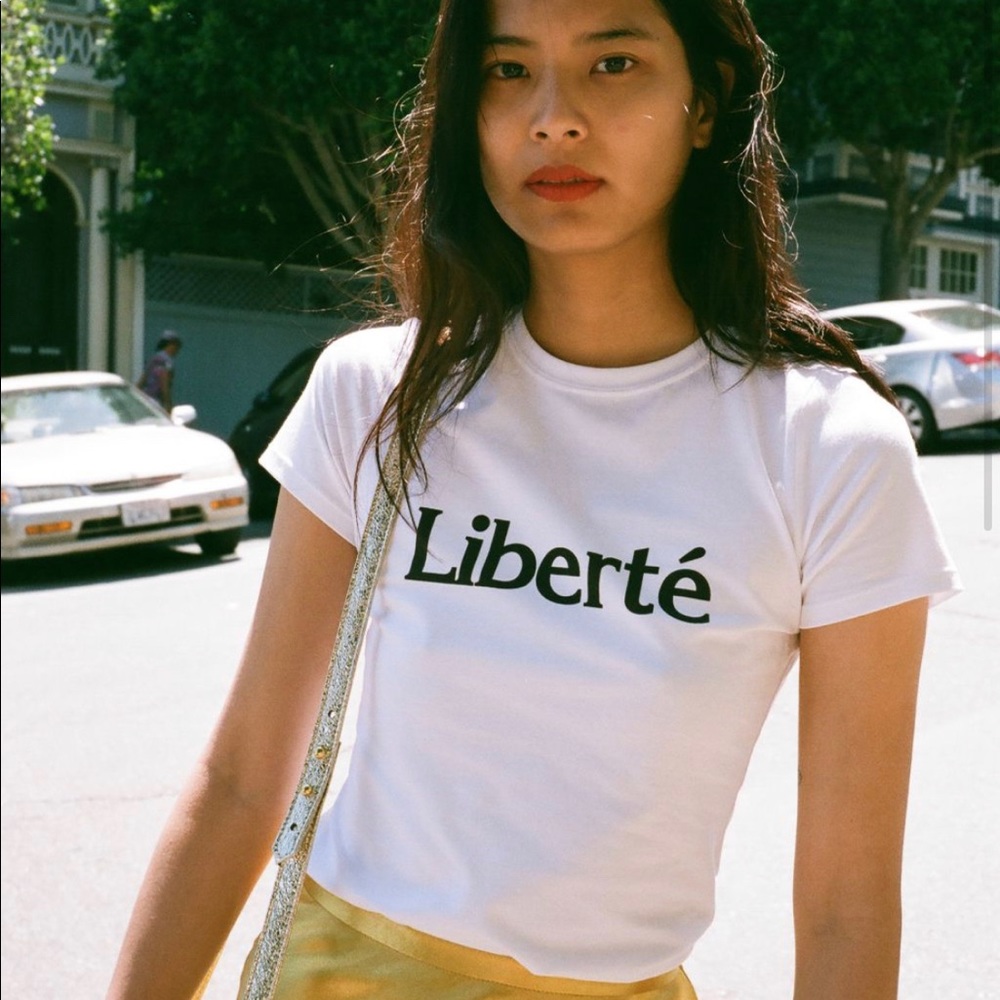 Liberté white shirt sleeve graphic tshirt